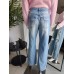 Wide Leg Jeans mit Abschürfungen - blau